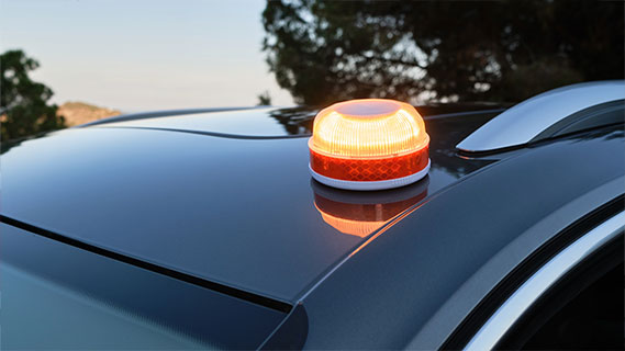 A close-up photo of an emergency light on top of a volunteer firefighter's vehicle